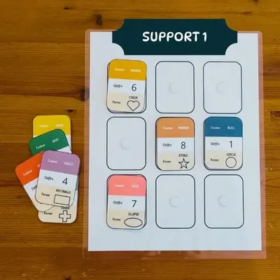 Placer les cartes au hasard sur le support 1 Placer les cartes au hasard sur le support 1
